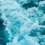 Flowing ice blue waves representing natural energy